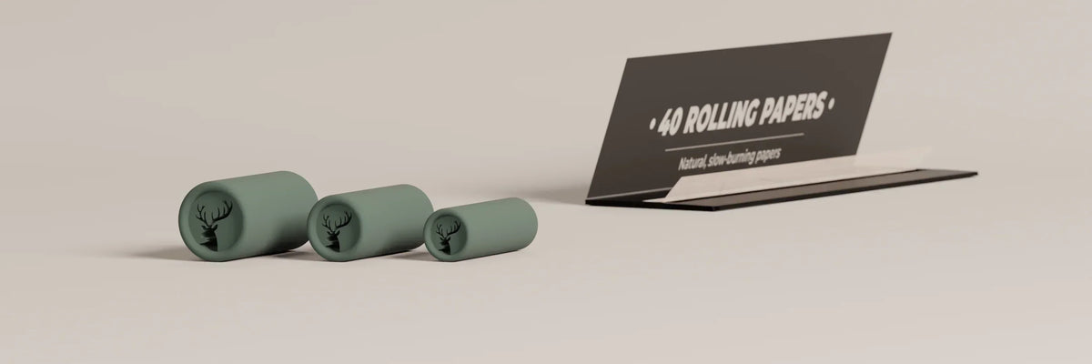 Three reusable filter sizes with rolling papers, showing how the paper wraps and sticks