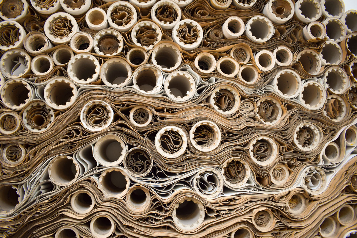 Stacked rolls of paper seen from the end