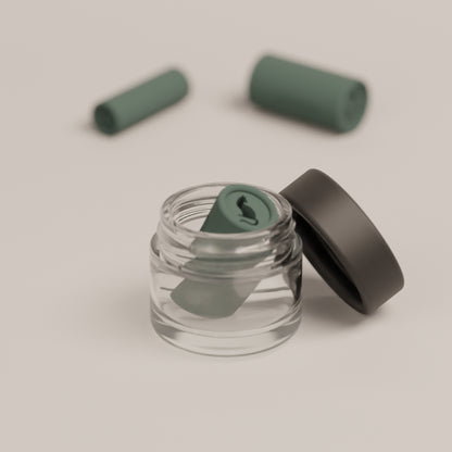 Reusable filter tip with the Bastet cat design shown inside the cleaning case for easy maintenance