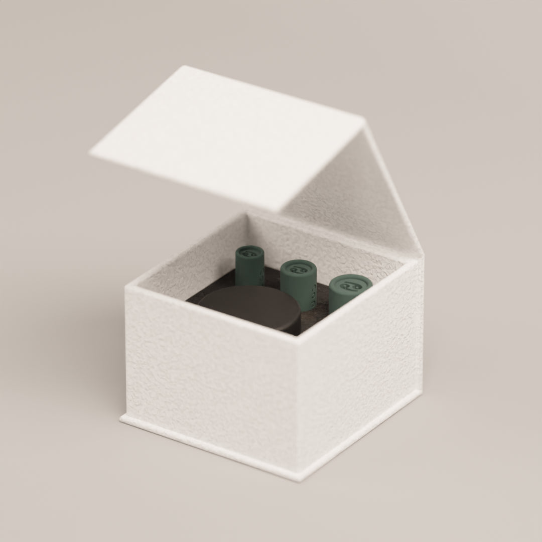 Reusable filter tip set with the Cancer design displayed in the storage box alongside the included cleaning case
