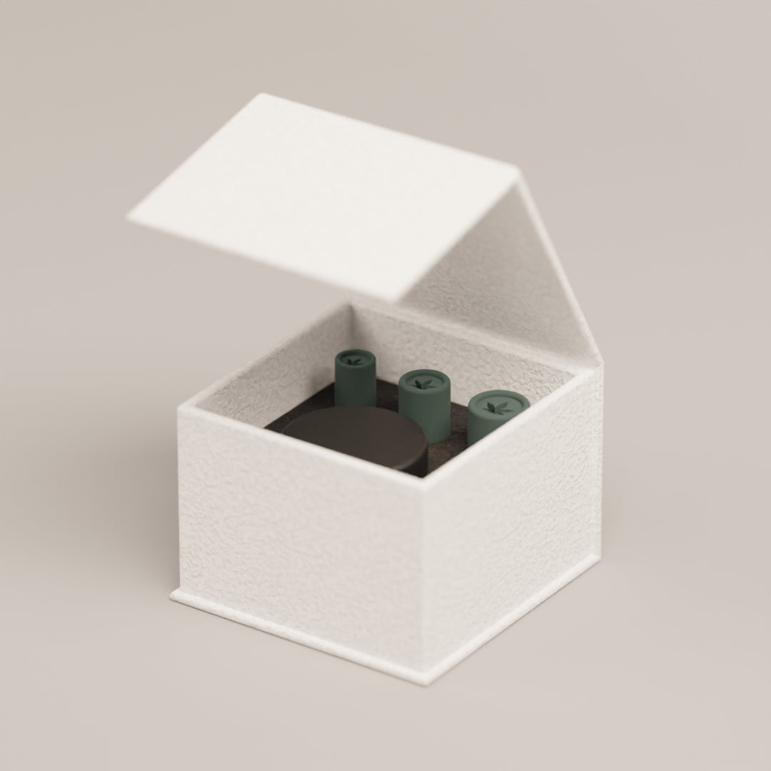 Reusable filter tip set with the cannabis leaf design displayed in the storage box alongside the included cleaning case