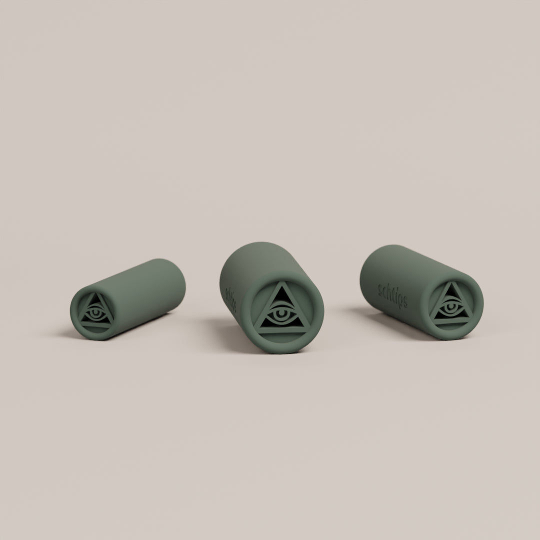 Reusable filter tips with the all seeing eye design shown in 8mm, 10mm, and 12mm sizes for different rolling preferences