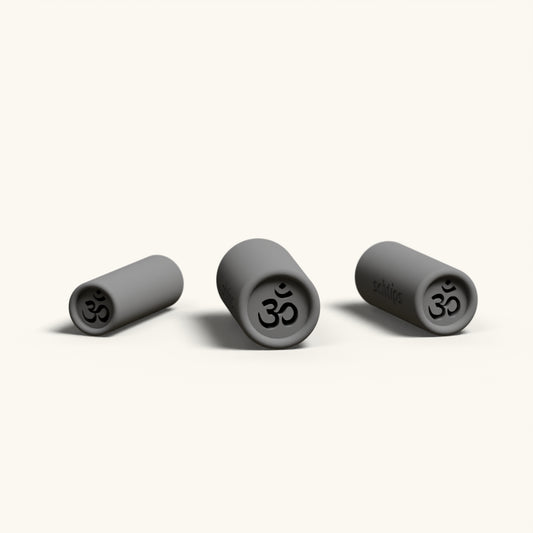 The three sizes of the Om design, 8mm, 10mm, and 12mm, lined up on a cream background